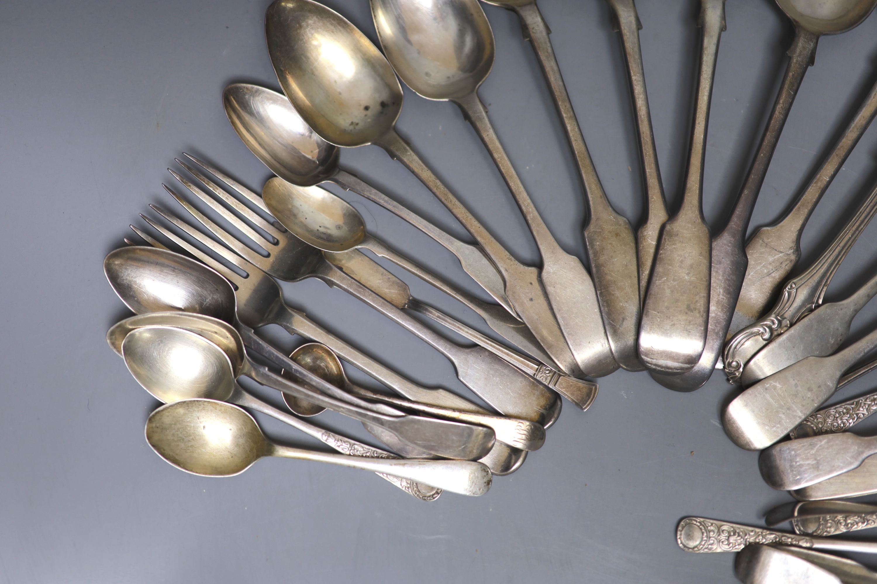 Five Victorian Scottish silver fiddle pattern table forks and twenty five other items of 19th century and later flatware, various dates and makers